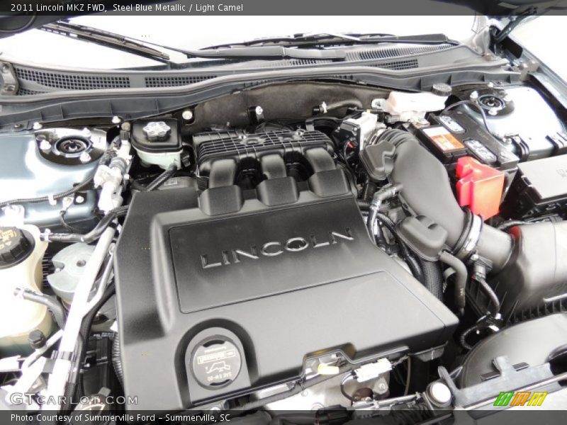 Steel Blue Metallic / Light Camel 2011 Lincoln MKZ FWD