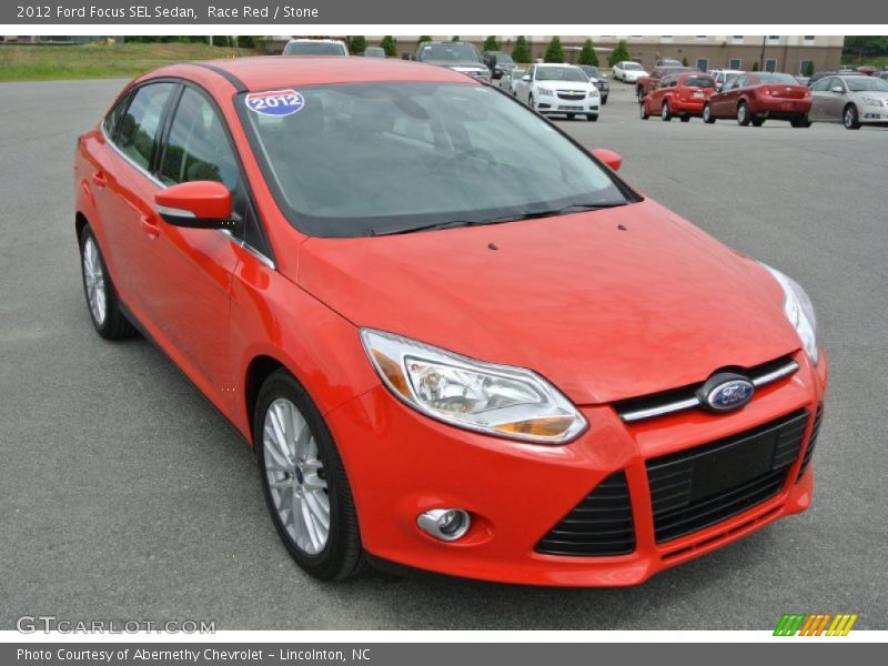 Race Red / Stone 2012 Ford Focus SEL Sedan