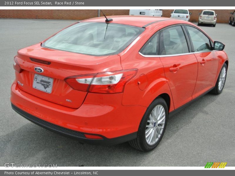 Race Red / Stone 2012 Ford Focus SEL Sedan