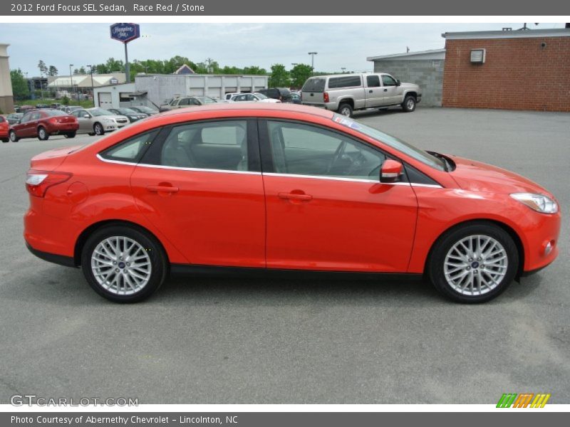 Race Red / Stone 2012 Ford Focus SEL Sedan