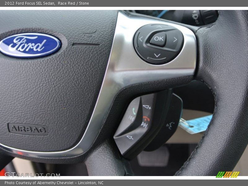 Race Red / Stone 2012 Ford Focus SEL Sedan