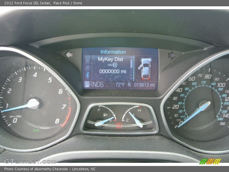 Race Red / Stone 2012 Ford Focus SEL Sedan