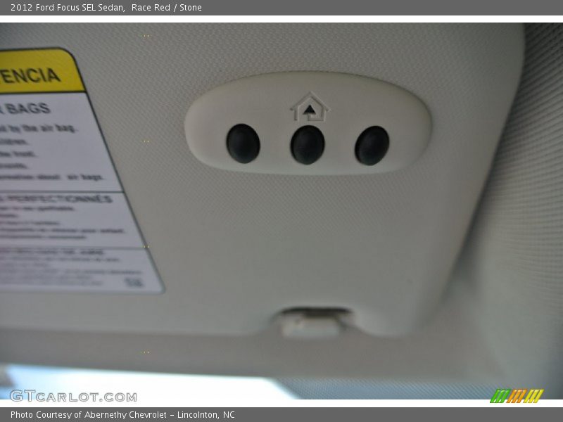 Race Red / Stone 2012 Ford Focus SEL Sedan