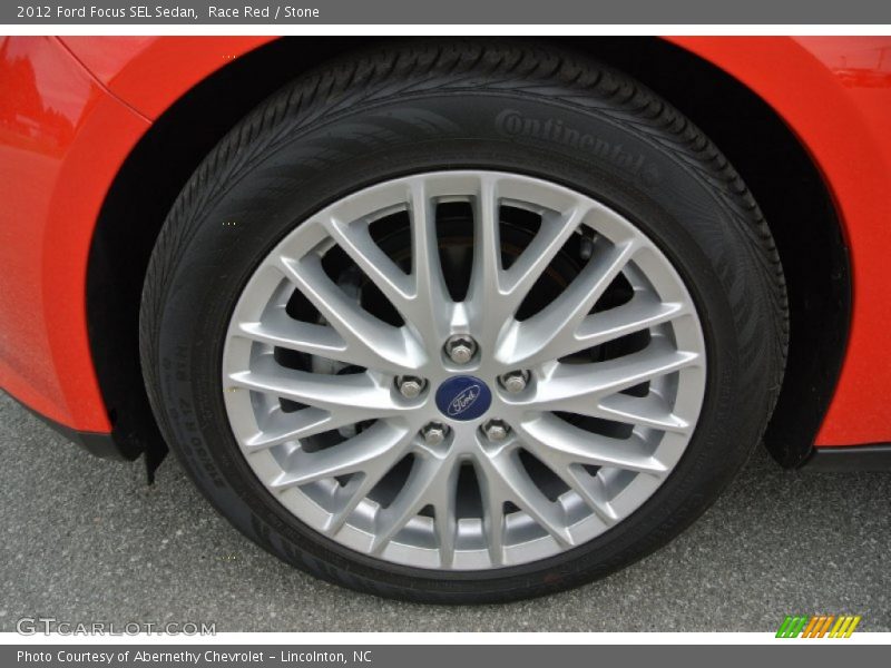Race Red / Stone 2012 Ford Focus SEL Sedan