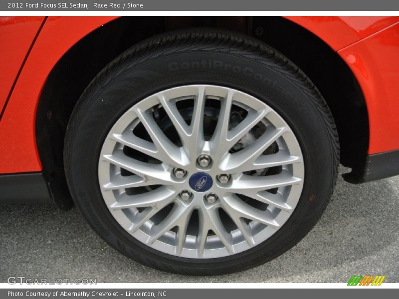 Race Red / Stone 2012 Ford Focus SEL Sedan