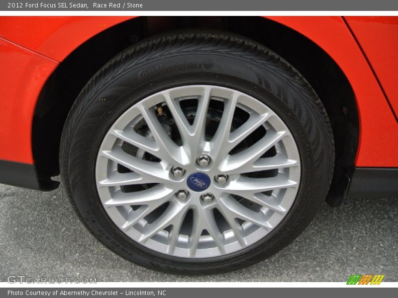 Race Red / Stone 2012 Ford Focus SEL Sedan