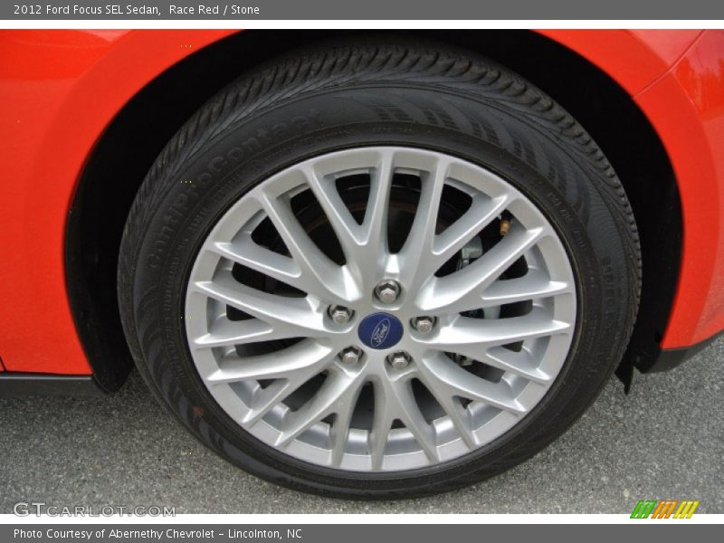 Race Red / Stone 2012 Ford Focus SEL Sedan