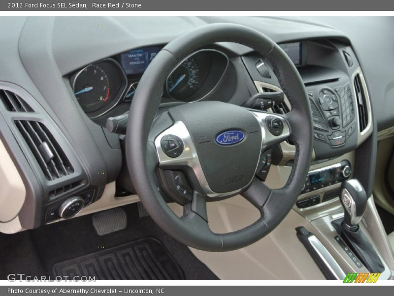 Race Red / Stone 2012 Ford Focus SEL Sedan