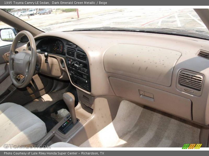 Dark Emerald Green Metallic / Beige 1995 Toyota Camry LE Sedan