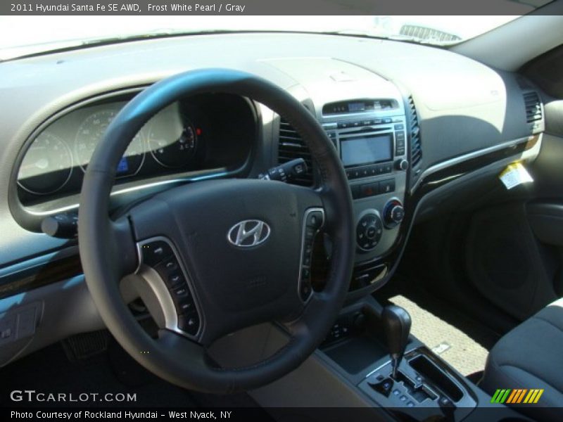 Frost White Pearl / Gray 2011 Hyundai Santa Fe SE AWD