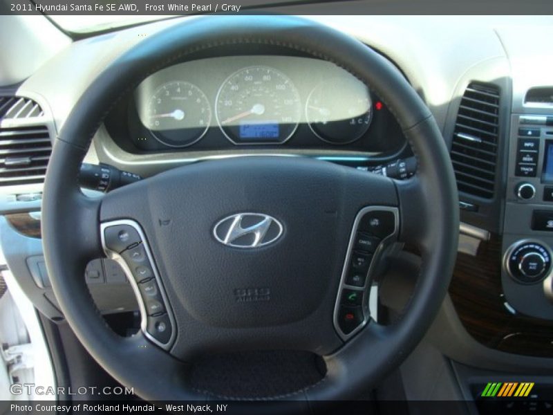 Frost White Pearl / Gray 2011 Hyundai Santa Fe SE AWD