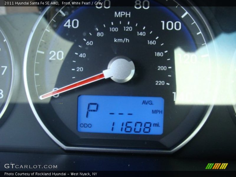 Frost White Pearl / Gray 2011 Hyundai Santa Fe SE AWD