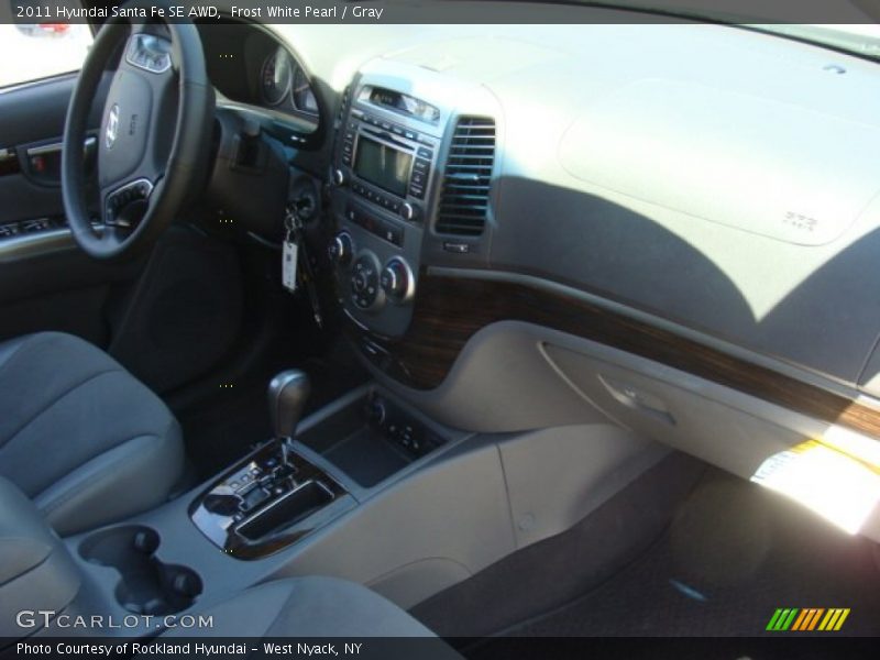 Frost White Pearl / Gray 2011 Hyundai Santa Fe SE AWD