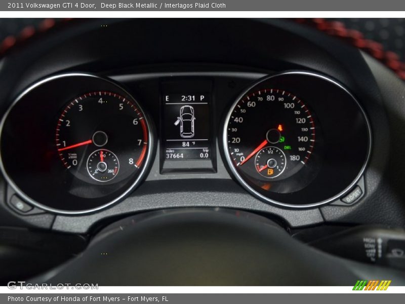 Deep Black Metallic / Interlagos Plaid Cloth 2011 Volkswagen GTI 4 Door