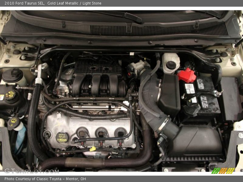 Gold Leaf Metallic / Light Stone 2010 Ford Taurus SEL