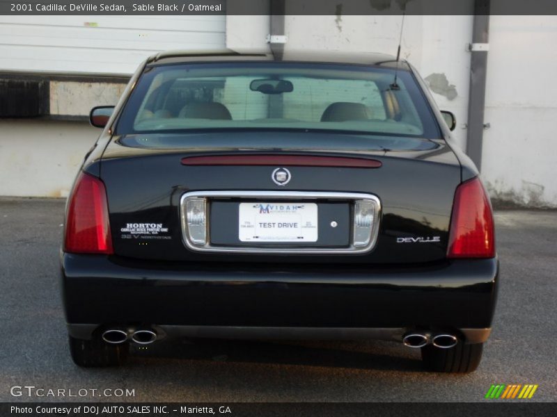 Sable Black / Oatmeal 2001 Cadillac DeVille Sedan