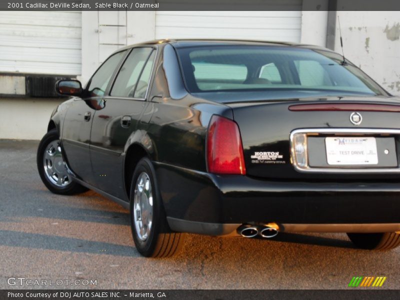 Sable Black / Oatmeal 2001 Cadillac DeVille Sedan
