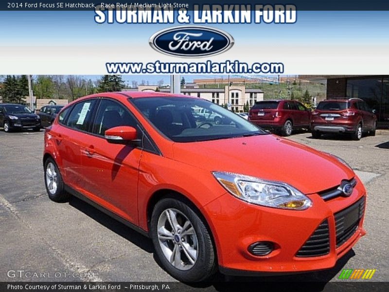 Race Red / Medium Light Stone 2014 Ford Focus SE Hatchback