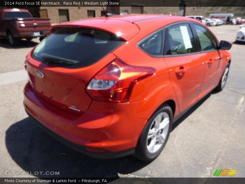 Race Red / Medium Light Stone 2014 Ford Focus SE Hatchback