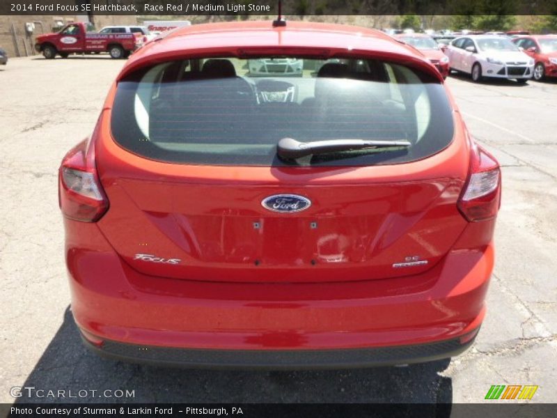 Race Red / Medium Light Stone 2014 Ford Focus SE Hatchback