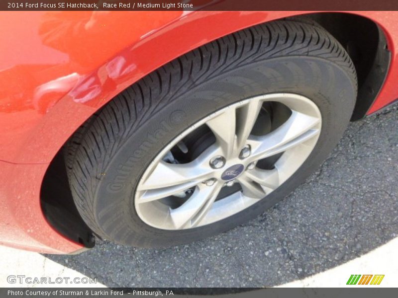 Race Red / Medium Light Stone 2014 Ford Focus SE Hatchback
