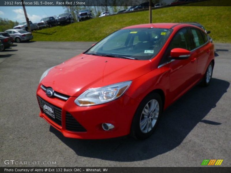 Race Red / Stone 2012 Ford Focus SEL 5-Door