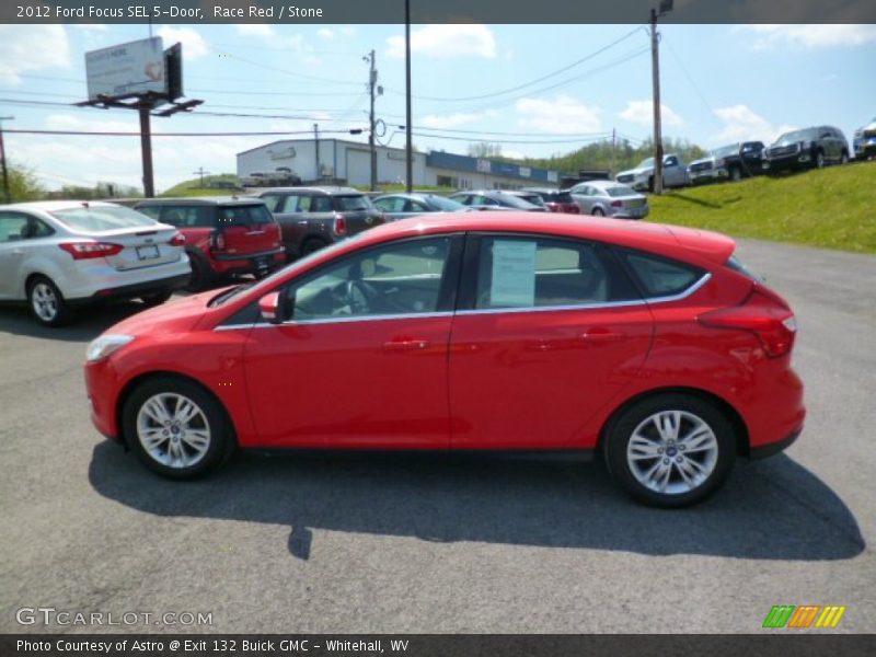 Race Red / Stone 2012 Ford Focus SEL 5-Door