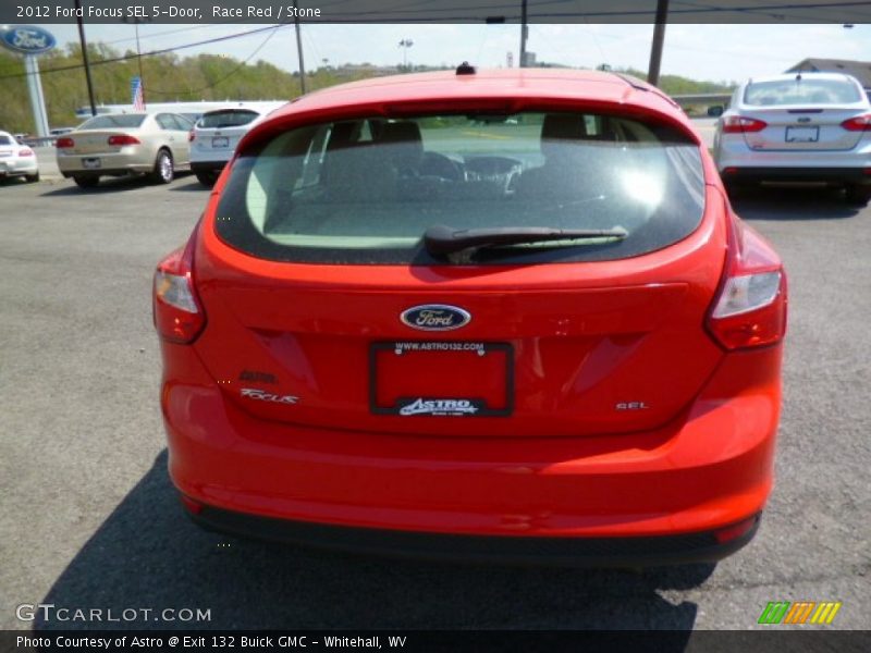 Race Red / Stone 2012 Ford Focus SEL 5-Door