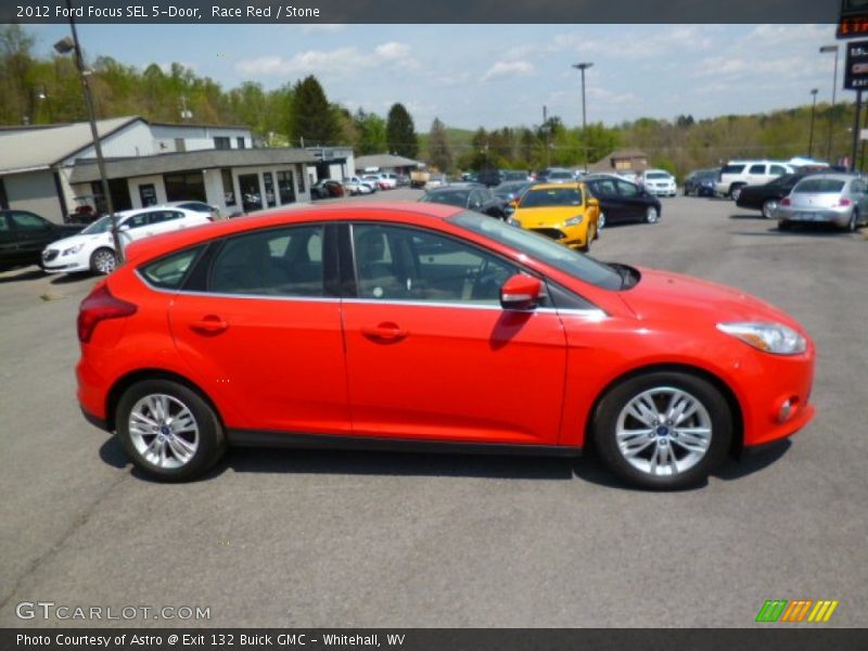 Race Red / Stone 2012 Ford Focus SEL 5-Door