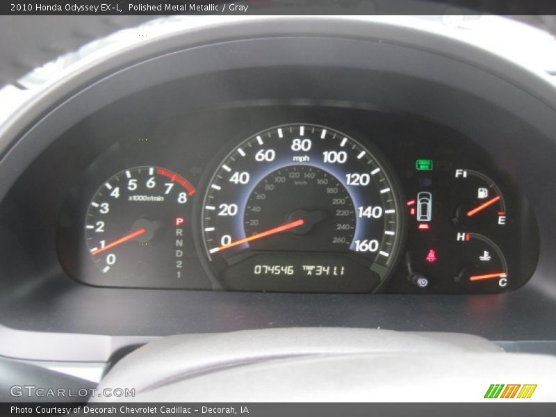 Polished Metal Metallic / Gray 2010 Honda Odyssey EX-L