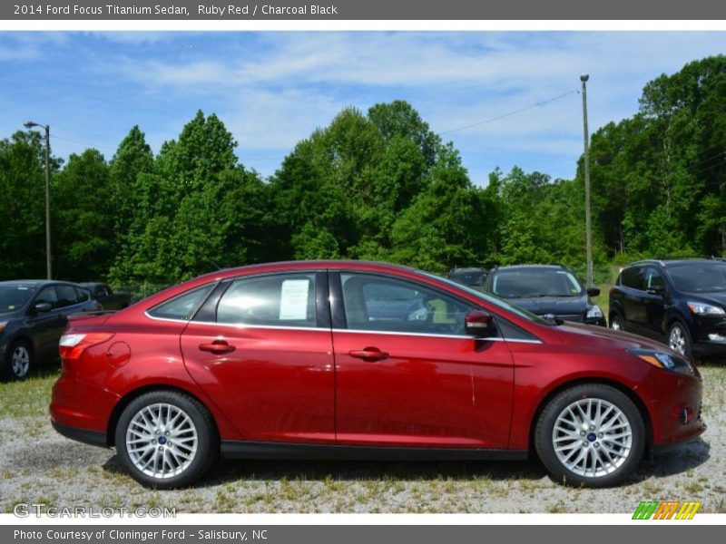Ruby Red / Charcoal Black 2014 Ford Focus Titanium Sedan