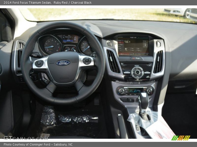 Ruby Red / Charcoal Black 2014 Ford Focus Titanium Sedan