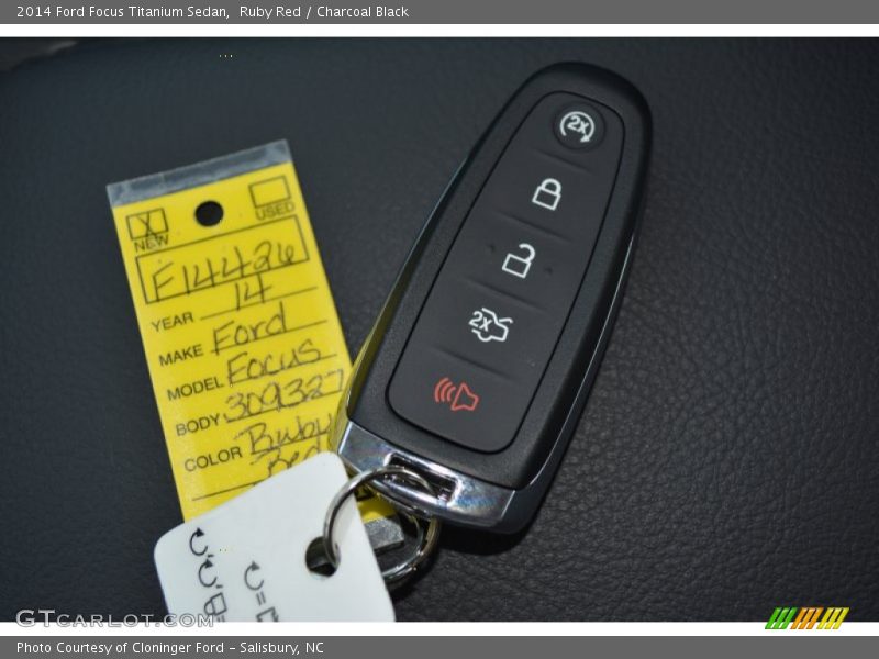 Ruby Red / Charcoal Black 2014 Ford Focus Titanium Sedan