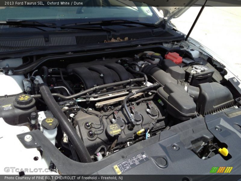 Oxford White / Dune 2013 Ford Taurus SEL
