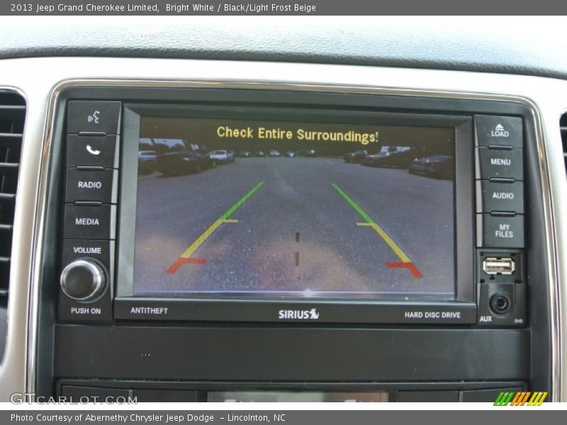 Bright White / Black/Light Frost Beige 2013 Jeep Grand Cherokee Limited