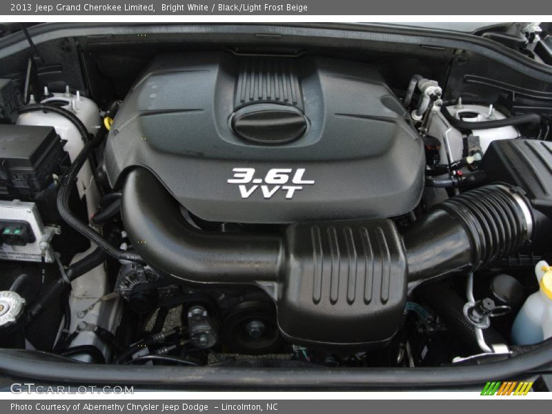 Bright White / Black/Light Frost Beige 2013 Jeep Grand Cherokee Limited