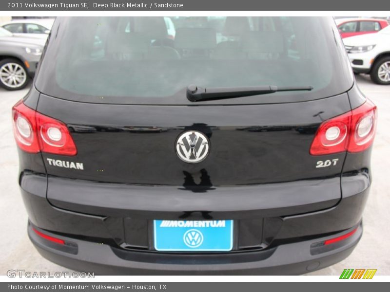 Deep Black Metallic / Sandstone 2011 Volkswagen Tiguan SE