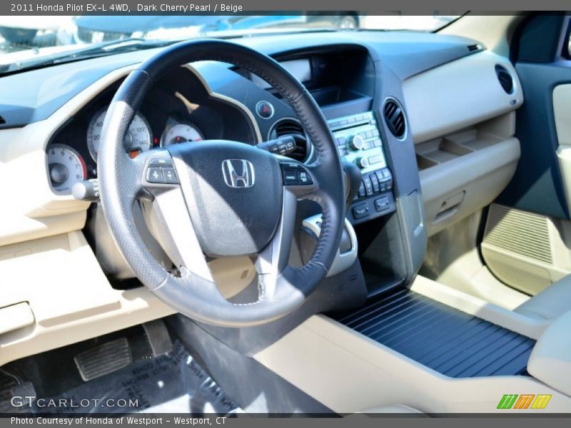 Dark Cherry Pearl / Beige 2011 Honda Pilot EX-L 4WD