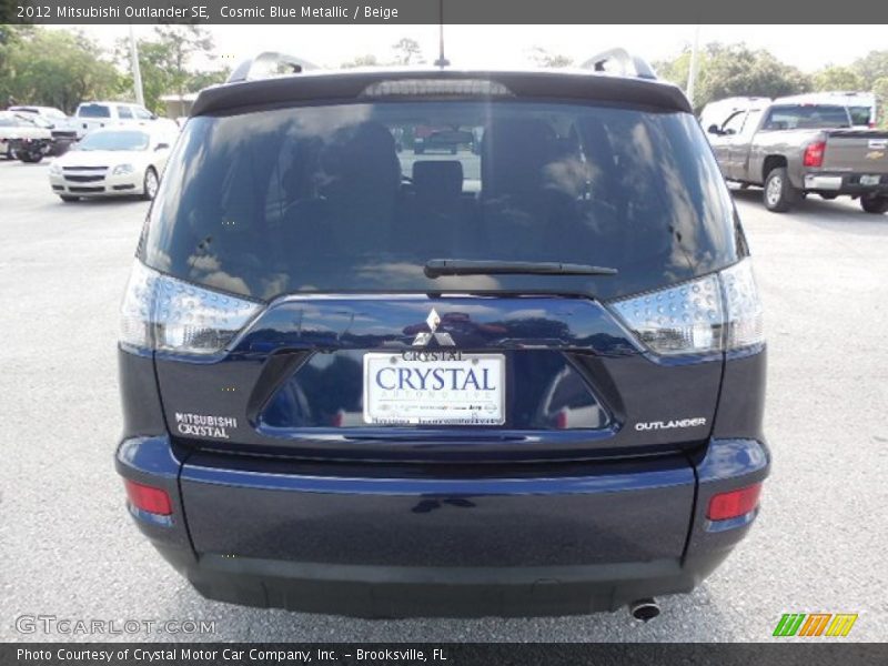 Cosmic Blue Metallic / Beige 2012 Mitsubishi Outlander SE