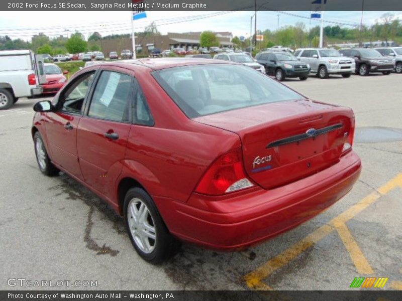 Sangria Red Metallic / Medium Graphite 2002 Ford Focus SE Sedan