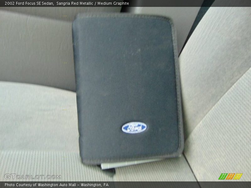 Sangria Red Metallic / Medium Graphite 2002 Ford Focus SE Sedan