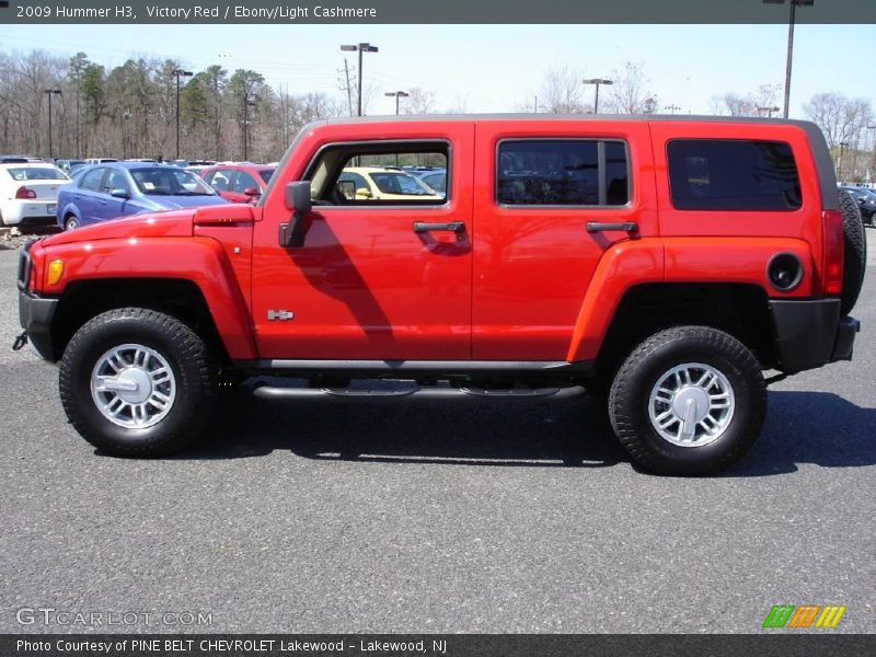 Victory Red / Ebony/Light Cashmere 2009 Hummer H3