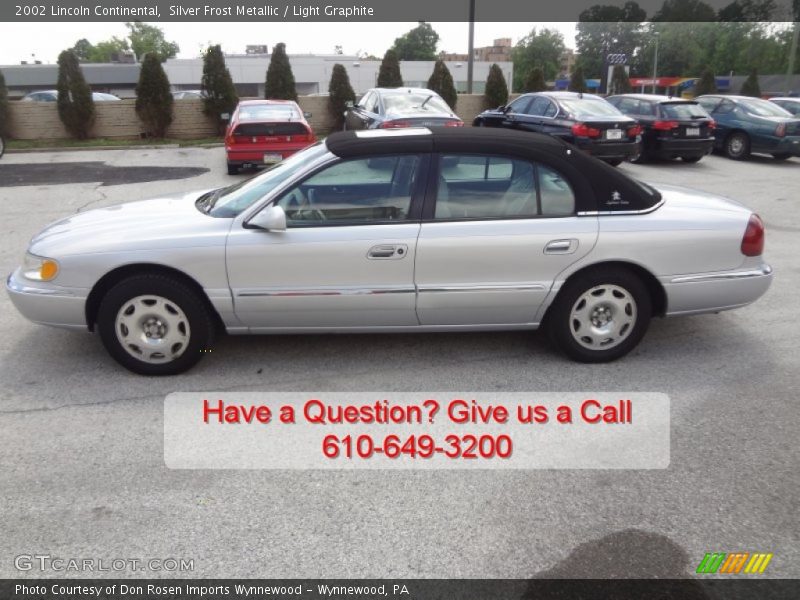 Silver Frost Metallic / Light Graphite 2002 Lincoln Continental