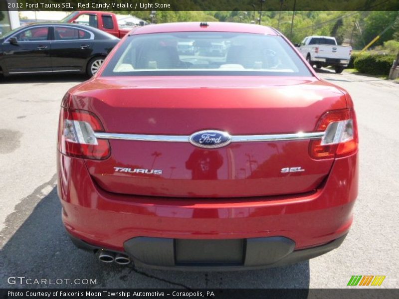 Red Candy Metallic / Light Stone 2012 Ford Taurus SEL