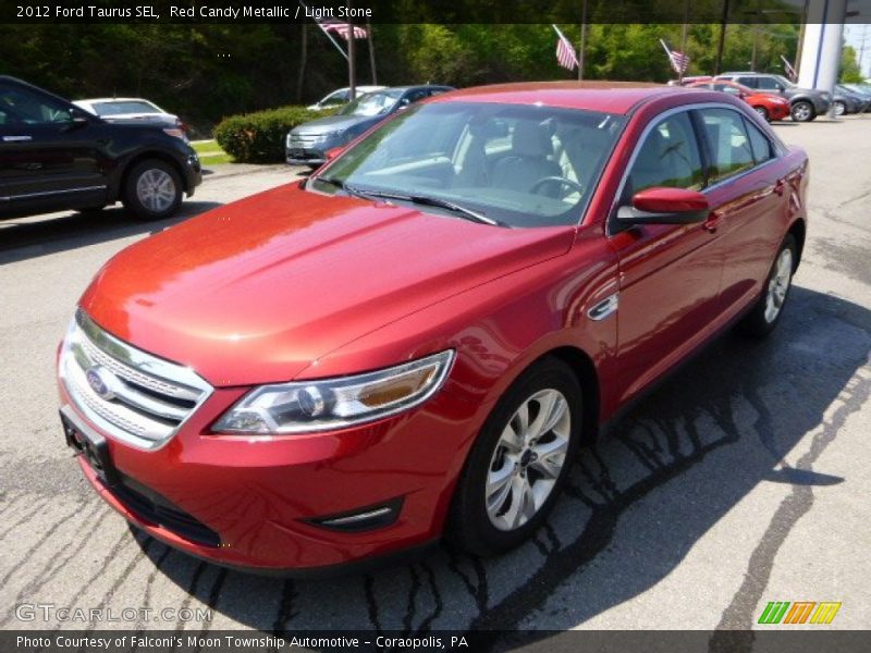 Red Candy Metallic / Light Stone 2012 Ford Taurus SEL