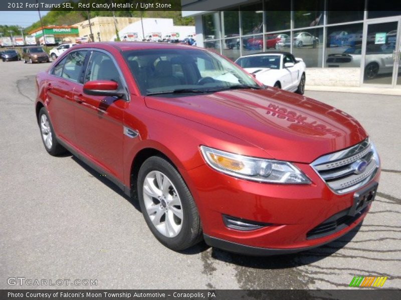 Red Candy Metallic / Light Stone 2012 Ford Taurus SEL
