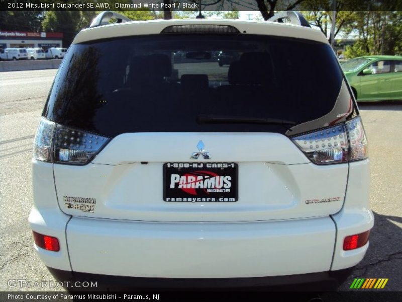 Diamond White Pearl / Black 2012 Mitsubishi Outlander SE AWD