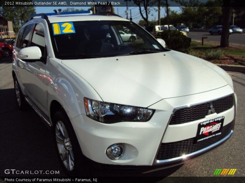 Diamond White Pearl / Black 2012 Mitsubishi Outlander SE AWD