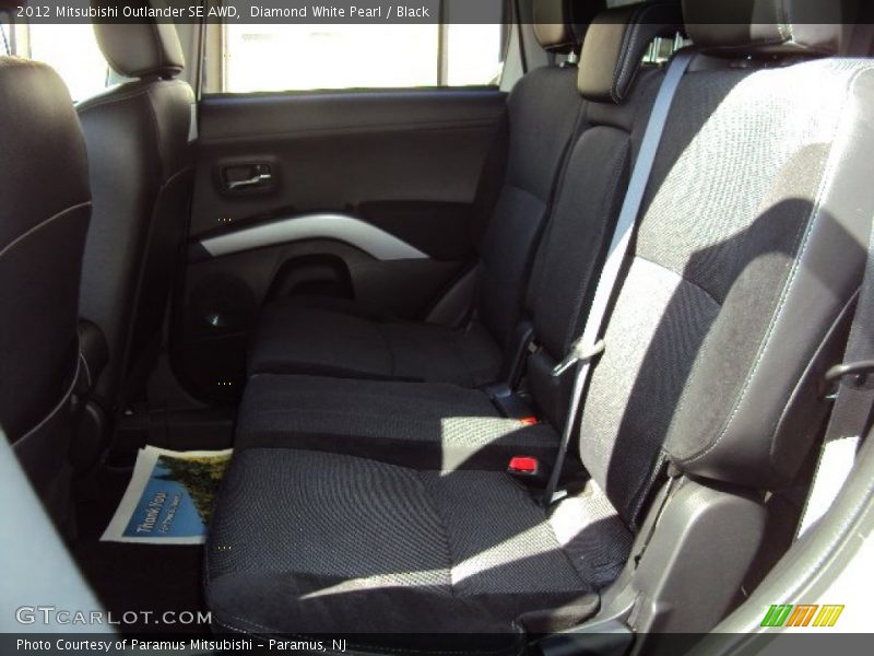 Diamond White Pearl / Black 2012 Mitsubishi Outlander SE AWD