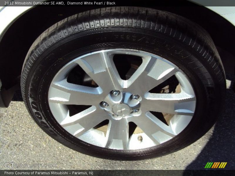 Diamond White Pearl / Black 2012 Mitsubishi Outlander SE AWD